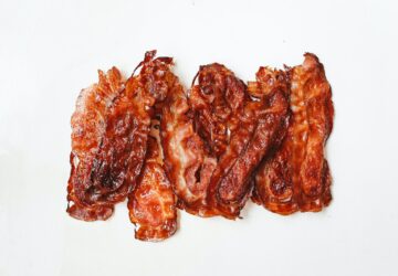 Fried Strips Of Meat On White Surface