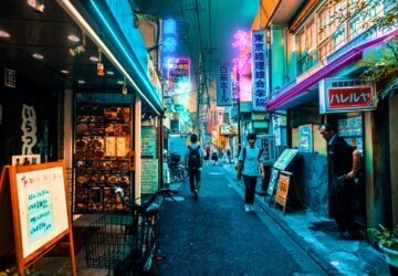 two person walking along the alley