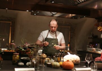 man standing in front of desk