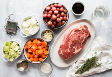sliced meat on white ceramic plate