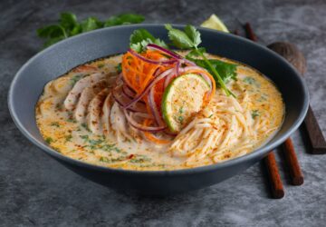pasta dish on black ceramic plate