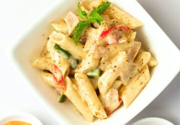 sauced penne pasta dish on bowl