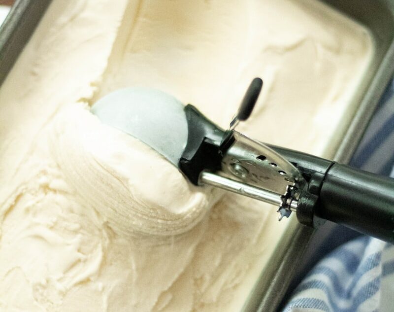 white and gray textile on white ceramic sink