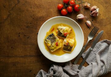 bacalao al pil pil, salted cod in emulsified olive oil sauce, spanish cuisine, basque country